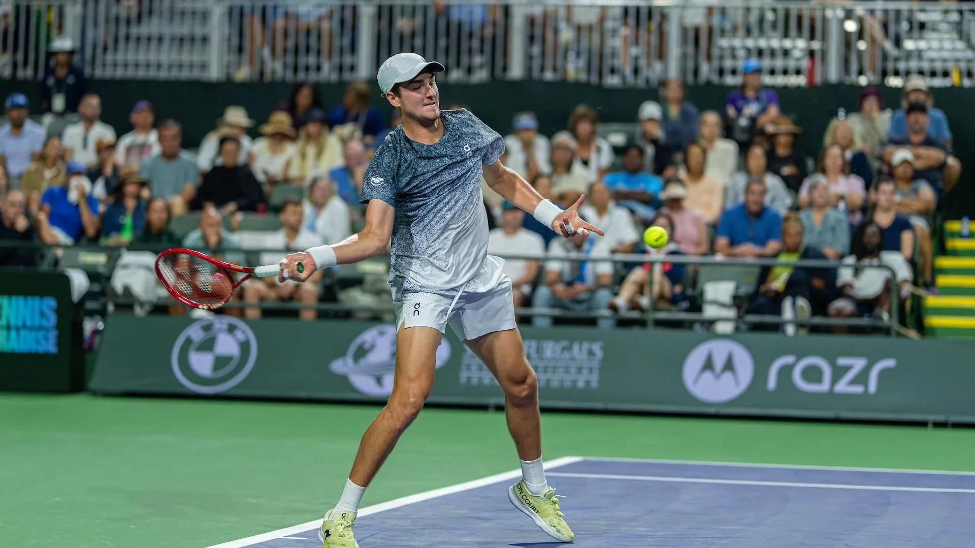 Tommy Paul stretches for a forehand during his match against Joao Fonseca at Indian Wells