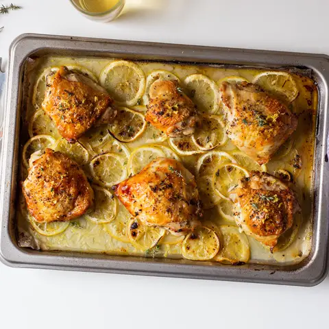 A prepared serving of sheet-pan lemon-pepper chicken
