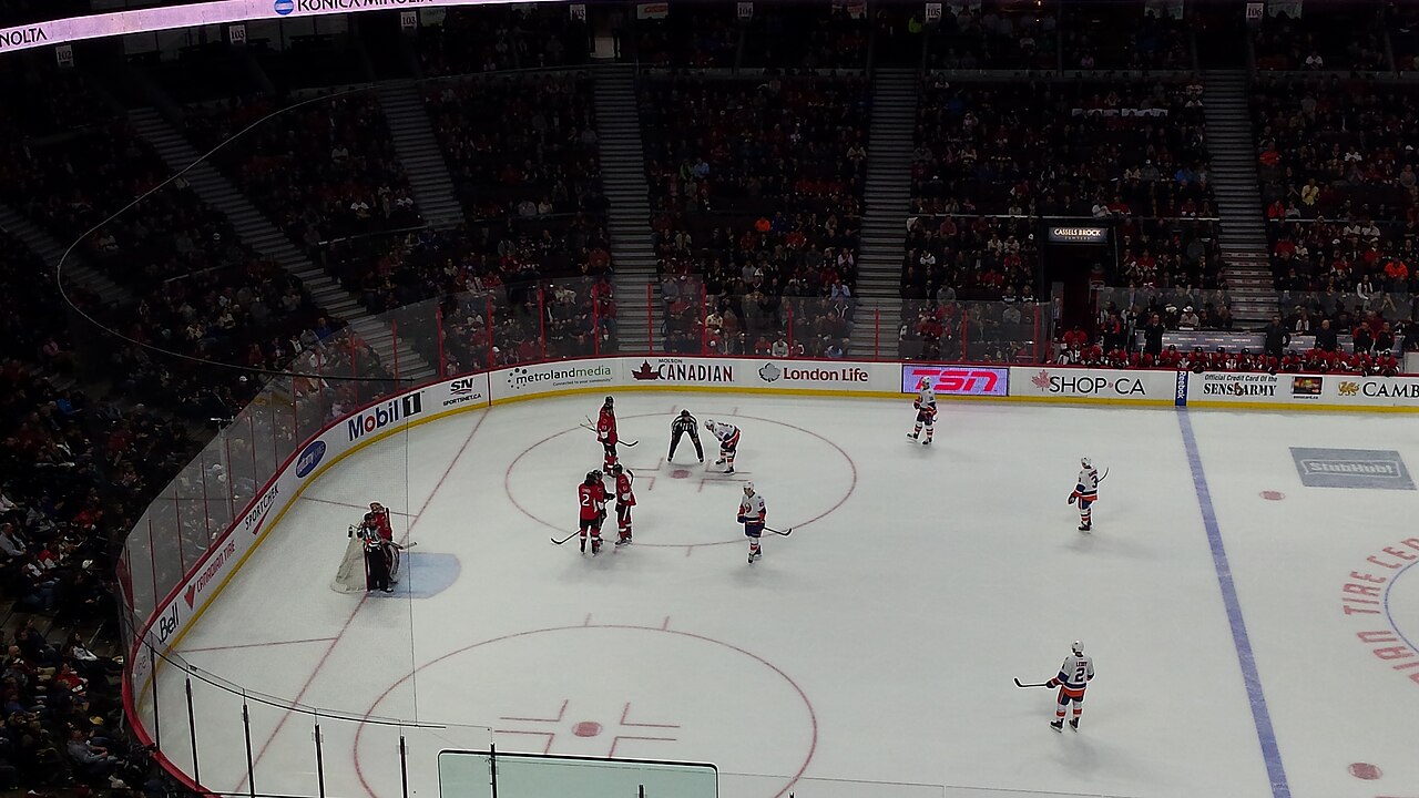 New York Islanders and Ottawa Senators players on the ice at Canadian Tire Centre in Kanata, Ontario, in a December 2015 game between the teams