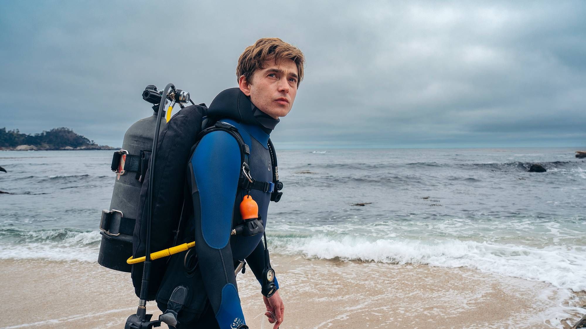 Austin Abrams underwater in the film Whalefall