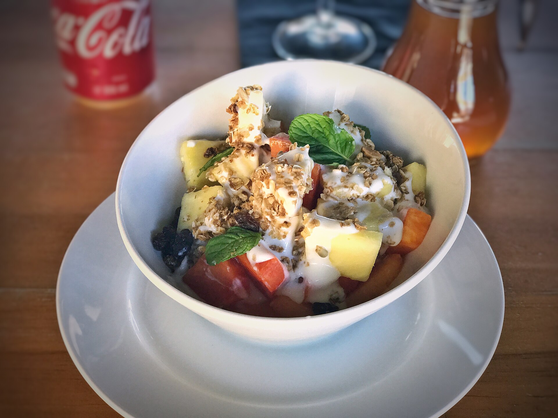 A prepared serving of banana-peanut butter yogurt parfait