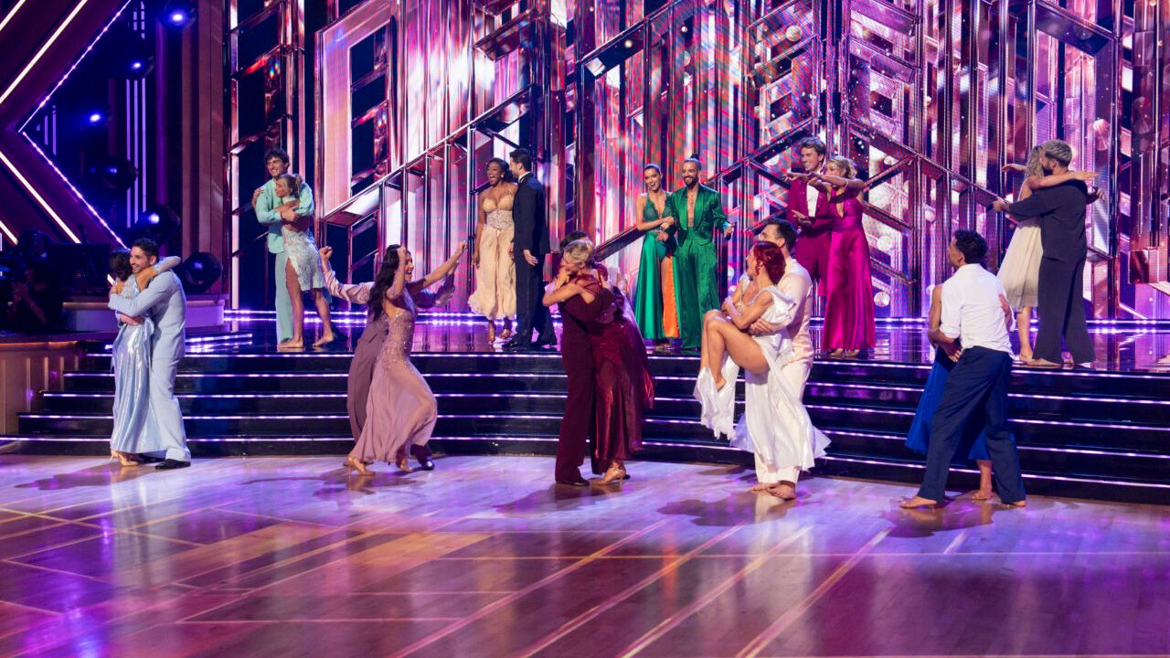 The Dancing With the Stars cast assembled on the ballroom stage.