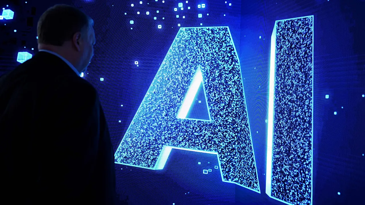A visitor watches an illuminated AI sign at Mobile World Congress in Barcelona; illustrative image, not Georgia election infrastructure