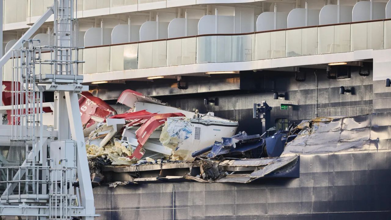 Damaged lifeboats and exterior structure on Mein Schiff 3 after the Bremerhaven collision.
