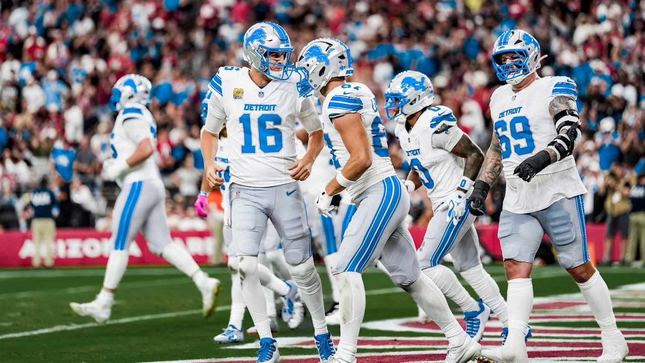 Detroit Lions players celebrate against the Arizona Cardinals