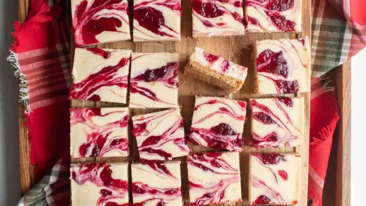 cranberry-swirl cheesecake bars as a finished dish ready to serve.