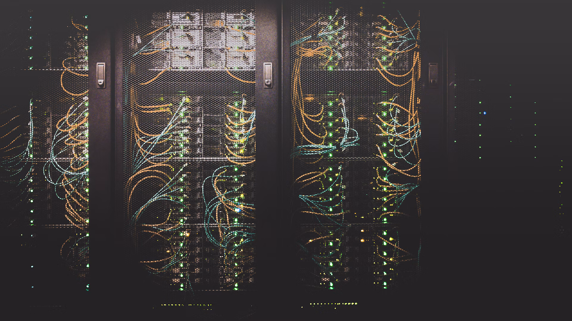 Server racks with network cables and indicator lights; illustrative infrastructure, not affected ConnectWise systems