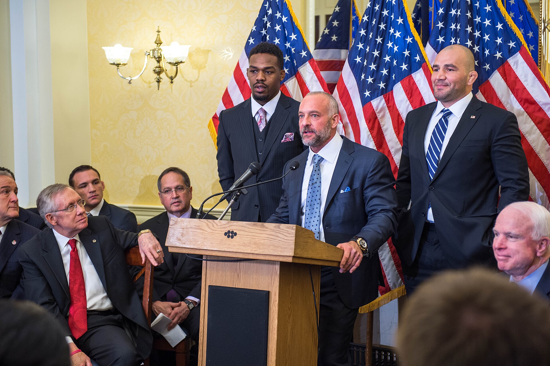 Jon Jones, left, with UFC chief executive Lorenzo Fertitta and fighter Glover Teixeira at a 2014 U.S. Senate event in Washington