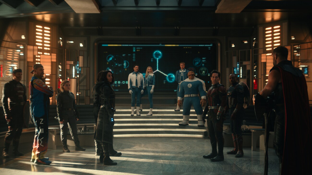 Captain America and Thor face one another inside a futuristic spacecraft in an official Avengers: Doomsday still.