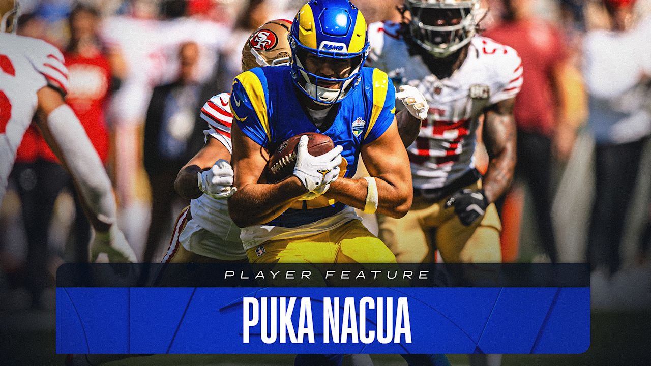 Los Angeles Rams receiver Puka Nacua carries the ball against San Francisco in an official Rams player-feature graphic.