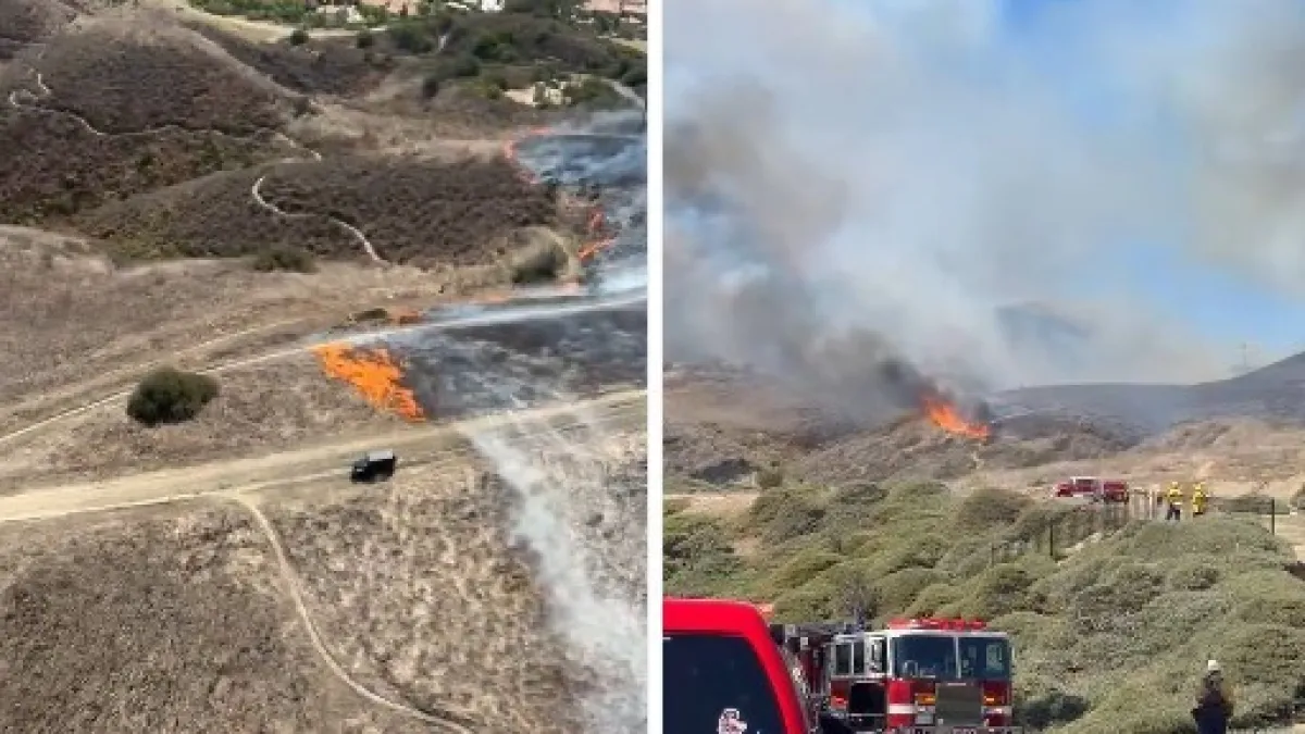 Smoke and flames from the Norte Fire burning near homes in San Clemente, California