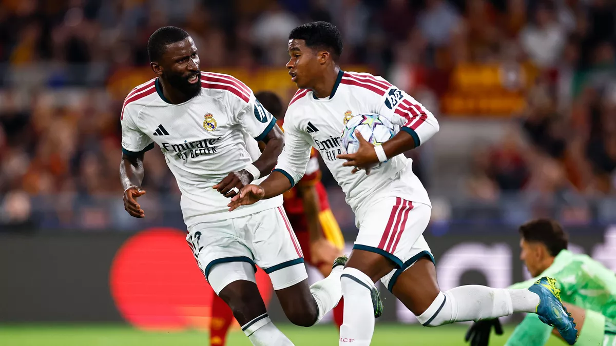 Real Madrid players celebrate during the comeback against Roma