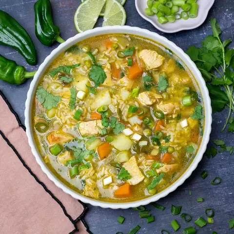 A prepared serving of chicken and vegetable recaito soup