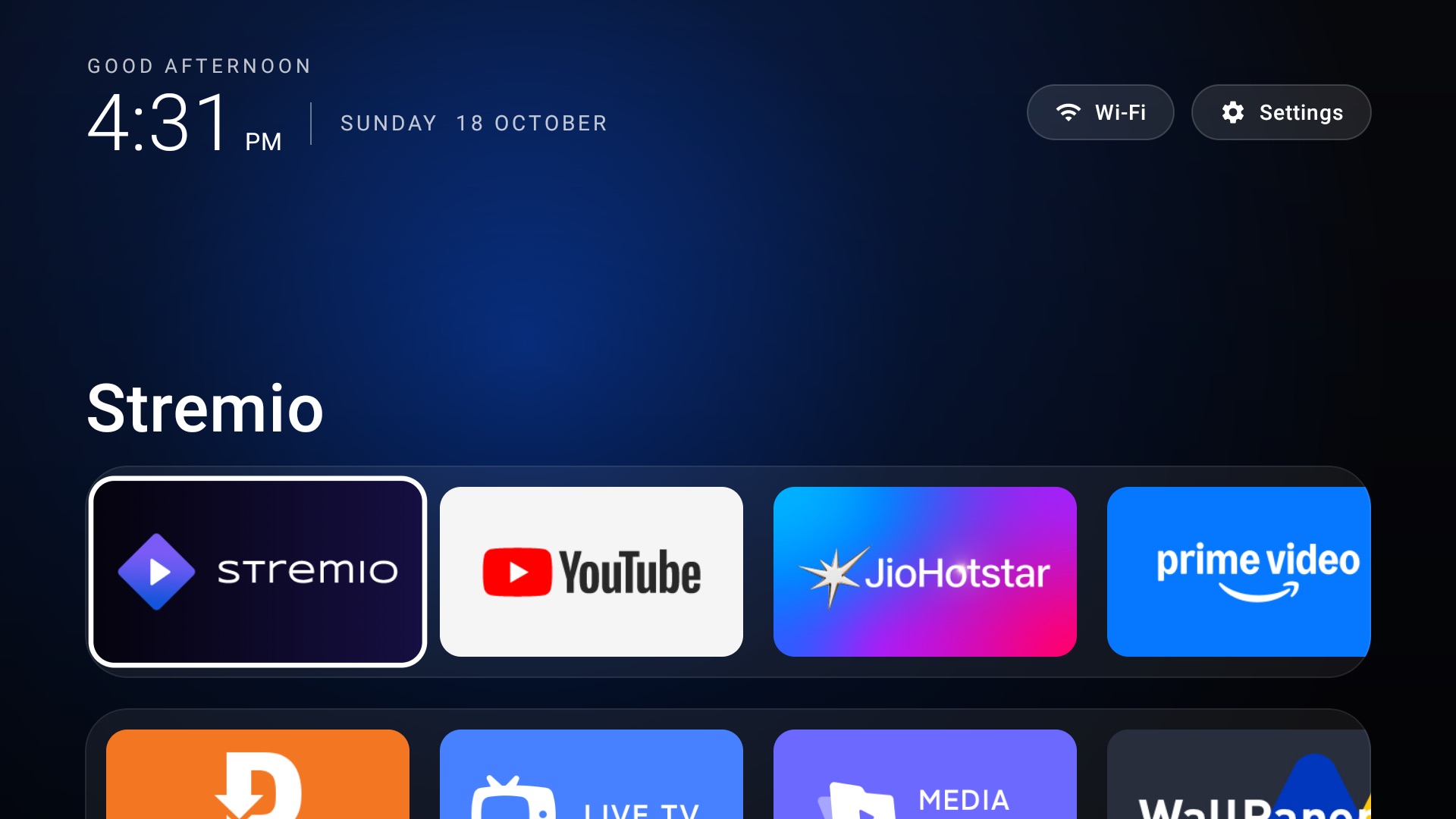 A customized Android TV launcher showing a clock, glowing app tiles, navigation shortcuts and a dark background