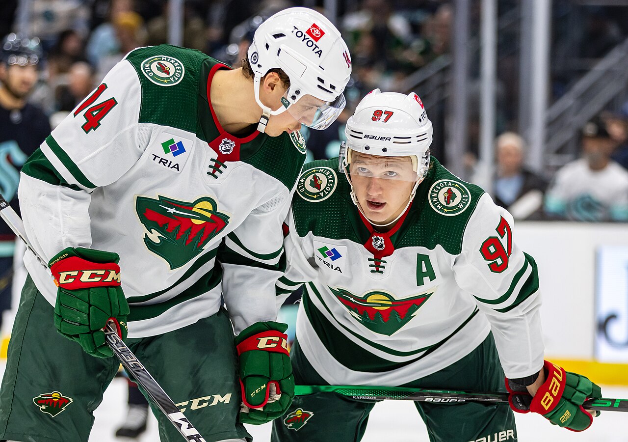 Minnesota Wild forwards Joel Eriksson Ek and Kirill Kaprizov during a game at Climate Pledge Arena.