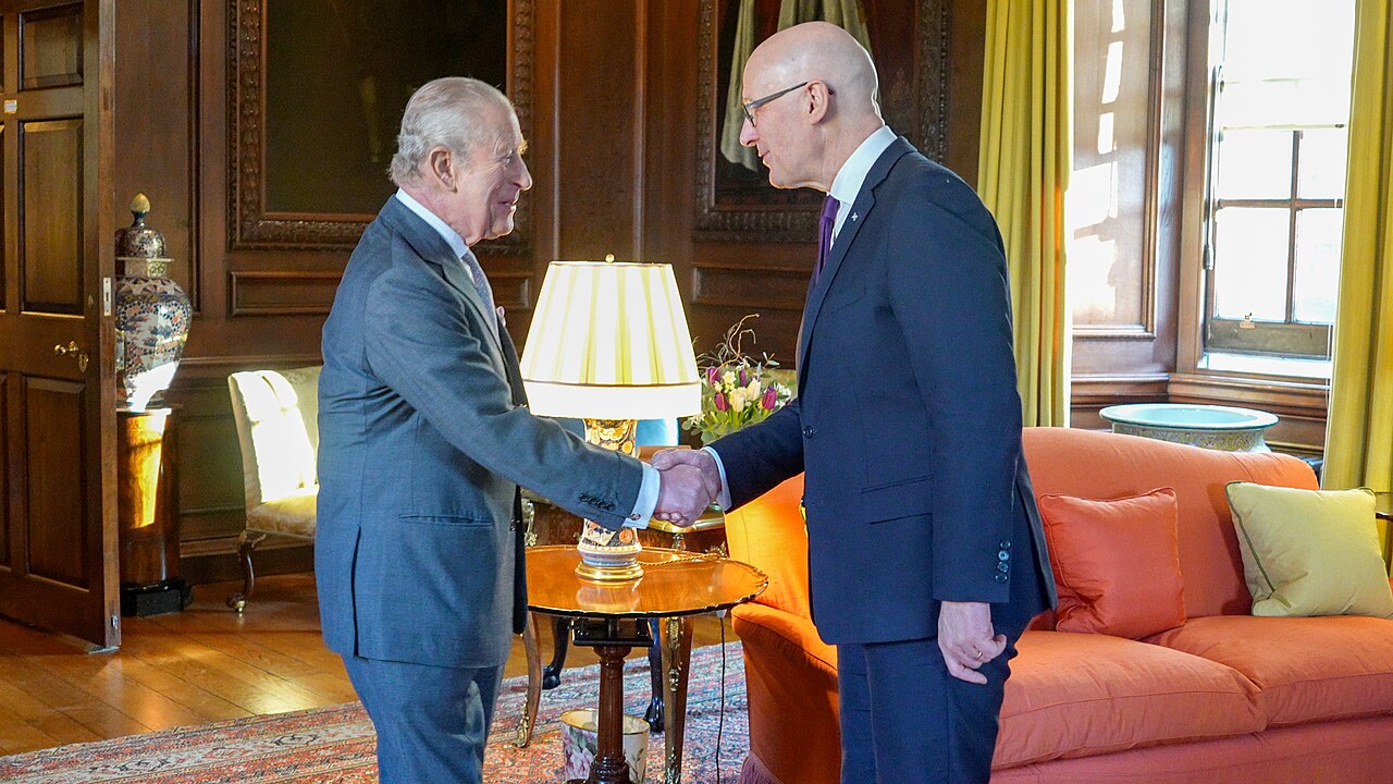 King Charles III speaks with Scotland’s first minister, John Swinney, at Holyrood Palace in January 2026.