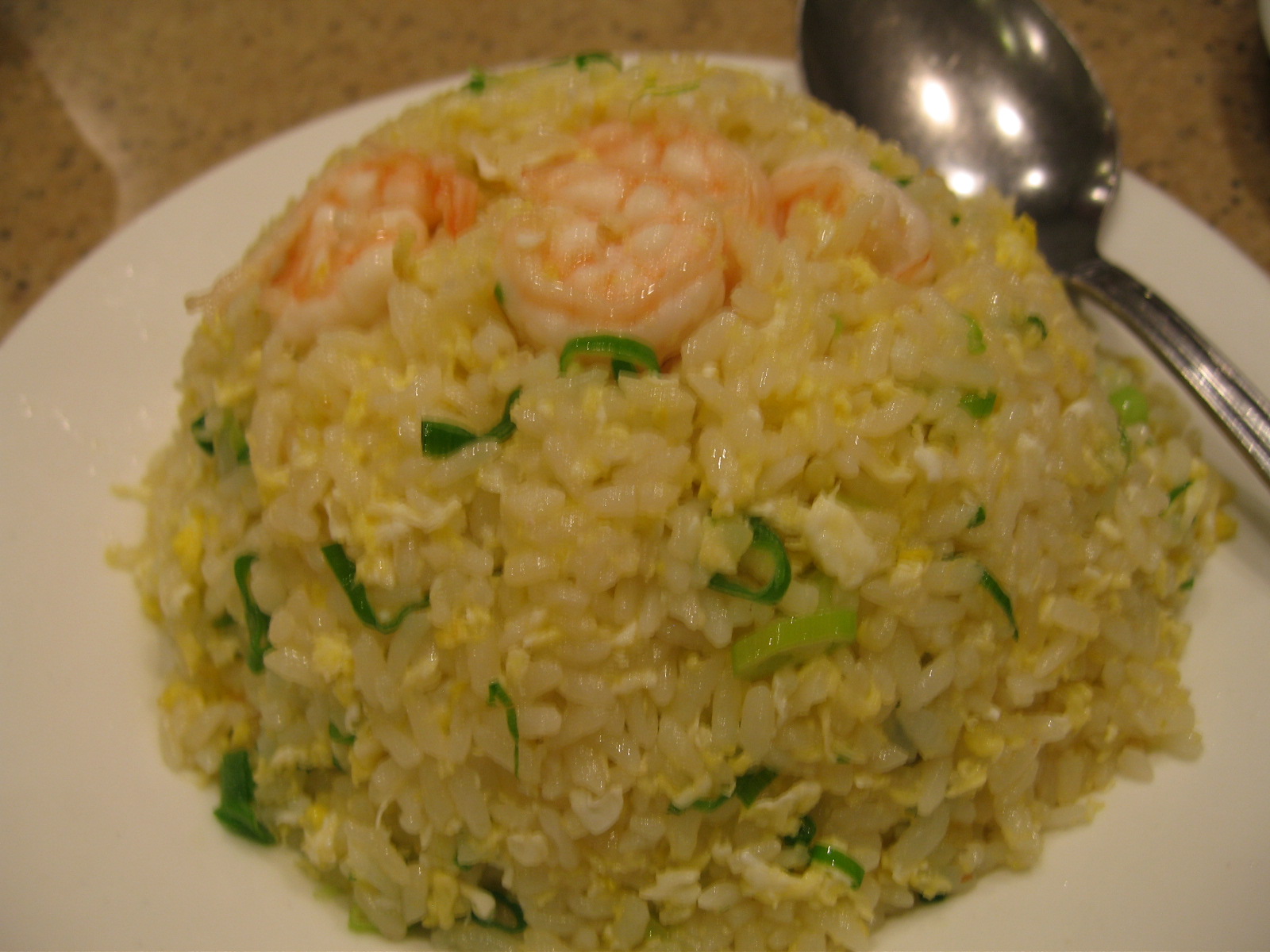 A prepared serving of shrimp cauliflower fried rice