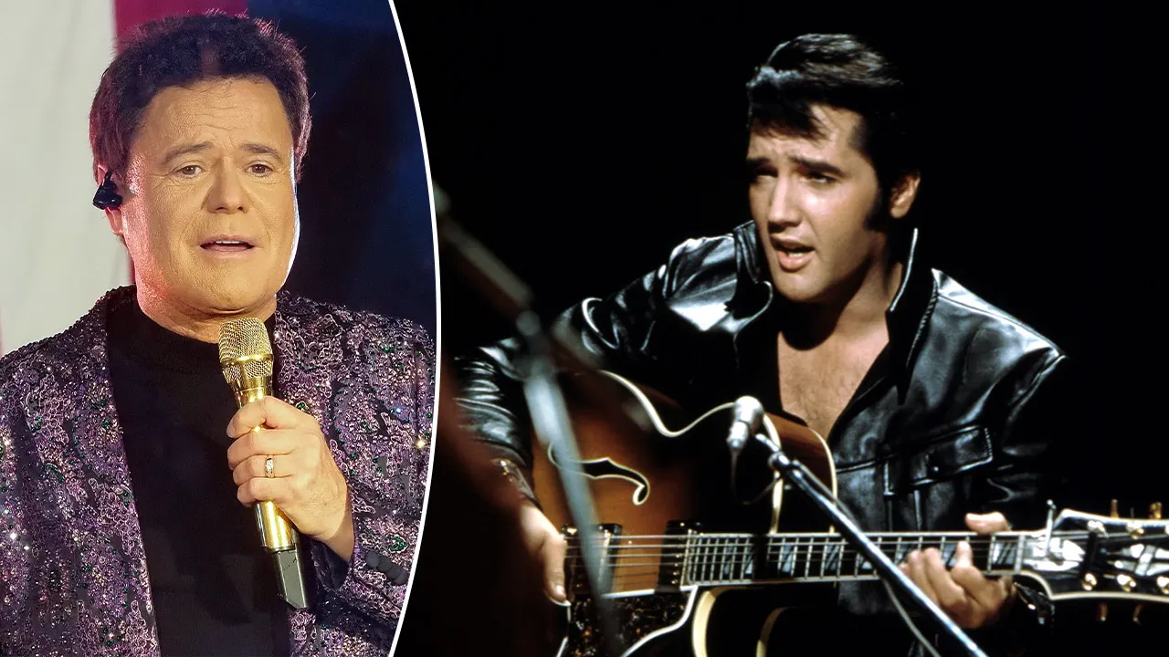 Donny Osmond performs beside a projected image of Elvis Presley playing guitar