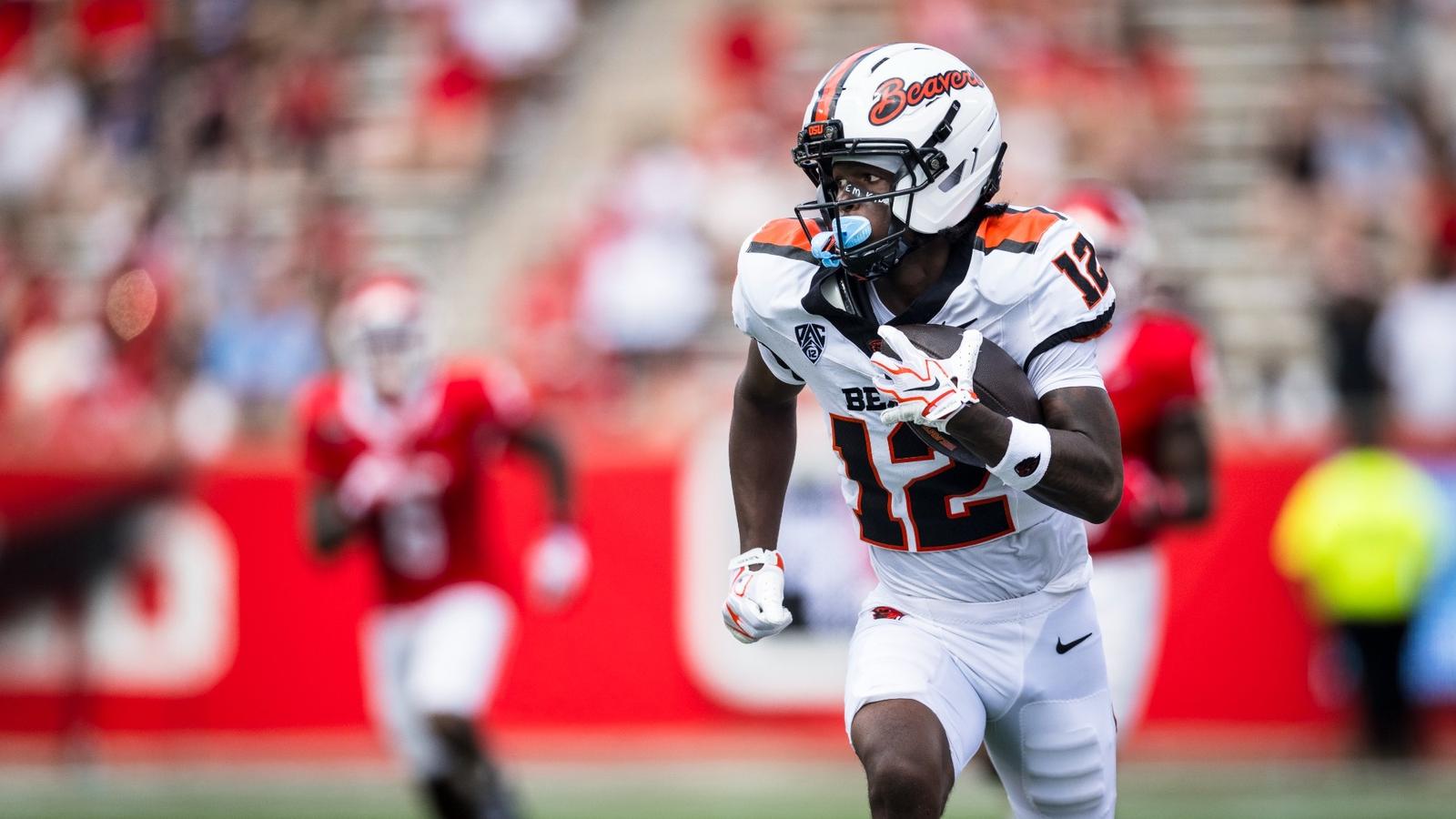 Oregon State receiver Jesse Legree runs with the ball during the Beavers' game against Houston