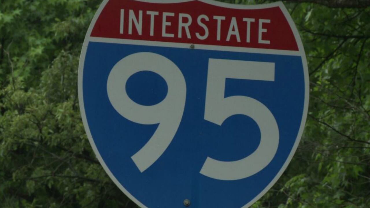 Illustrative close-up of an Interstate 95 highway shield, with no people visible.