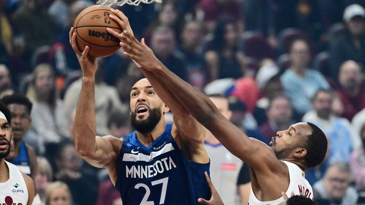 Minnesota center Rudy Gobert drives against Cleveland's Evan Mobley during a January 2026 game at Rocket Arena.