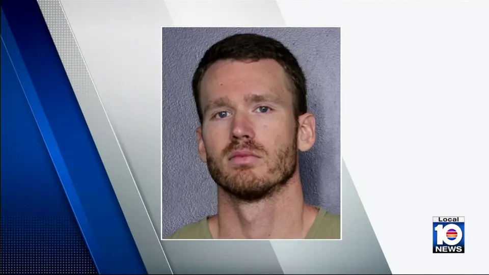 Booking photo of Lauderhill police officer Brian Louis Sguros shown in a Local 10 News report on the allegations.