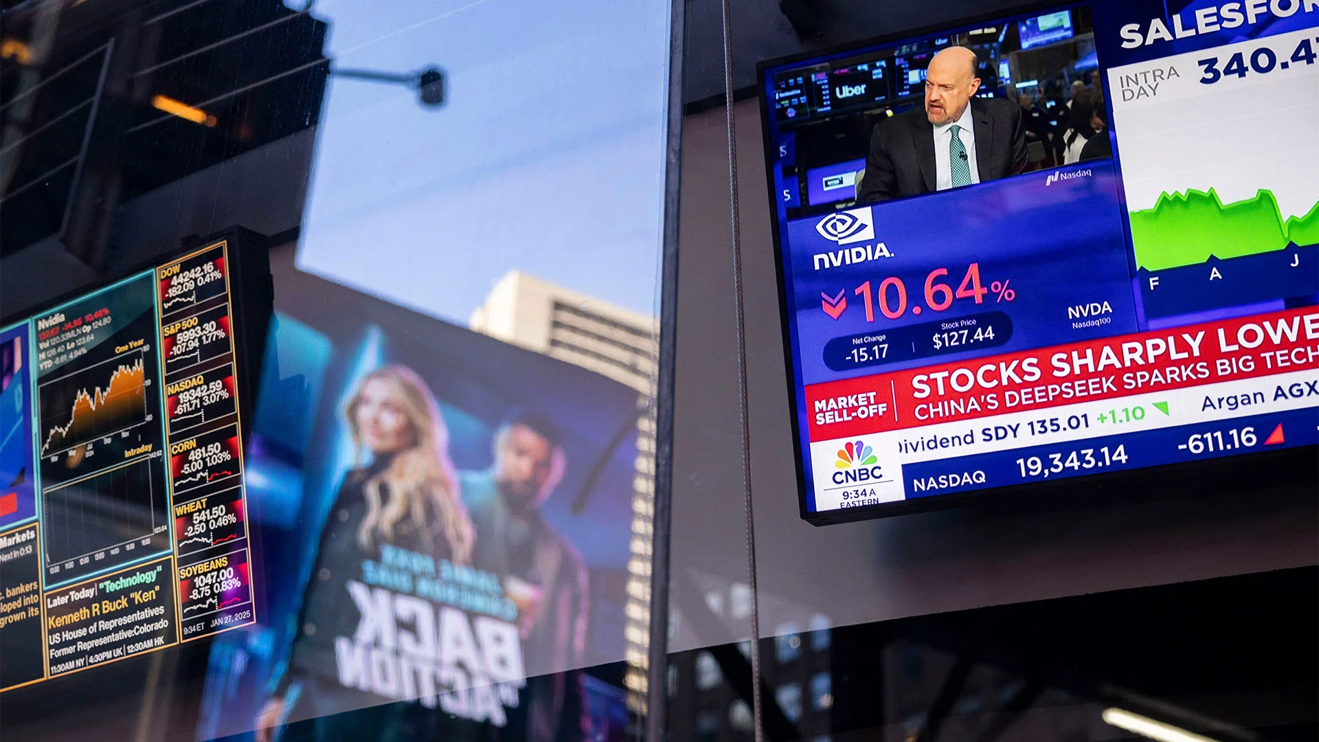 A CNBC screen outside Nasdaq MarketSite showing an earlier sharp drop in AI-linked stocks