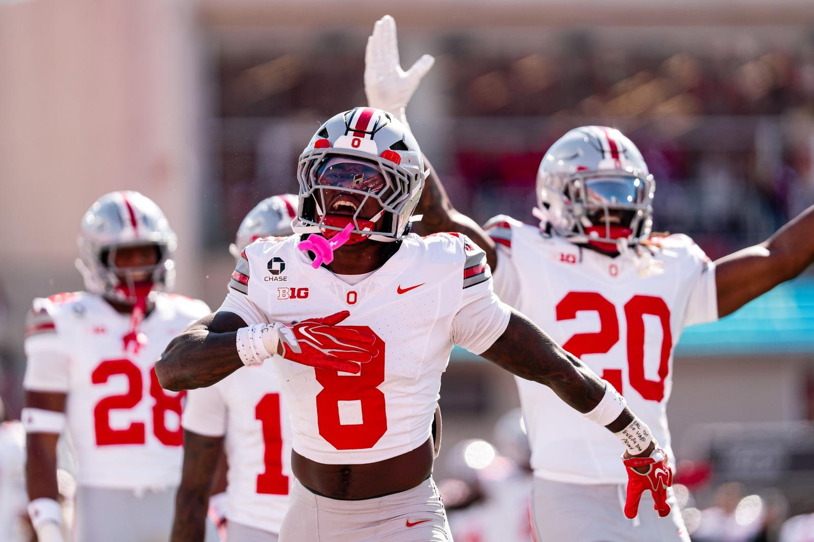 Ohio State football players celebrate their road win at Indiana