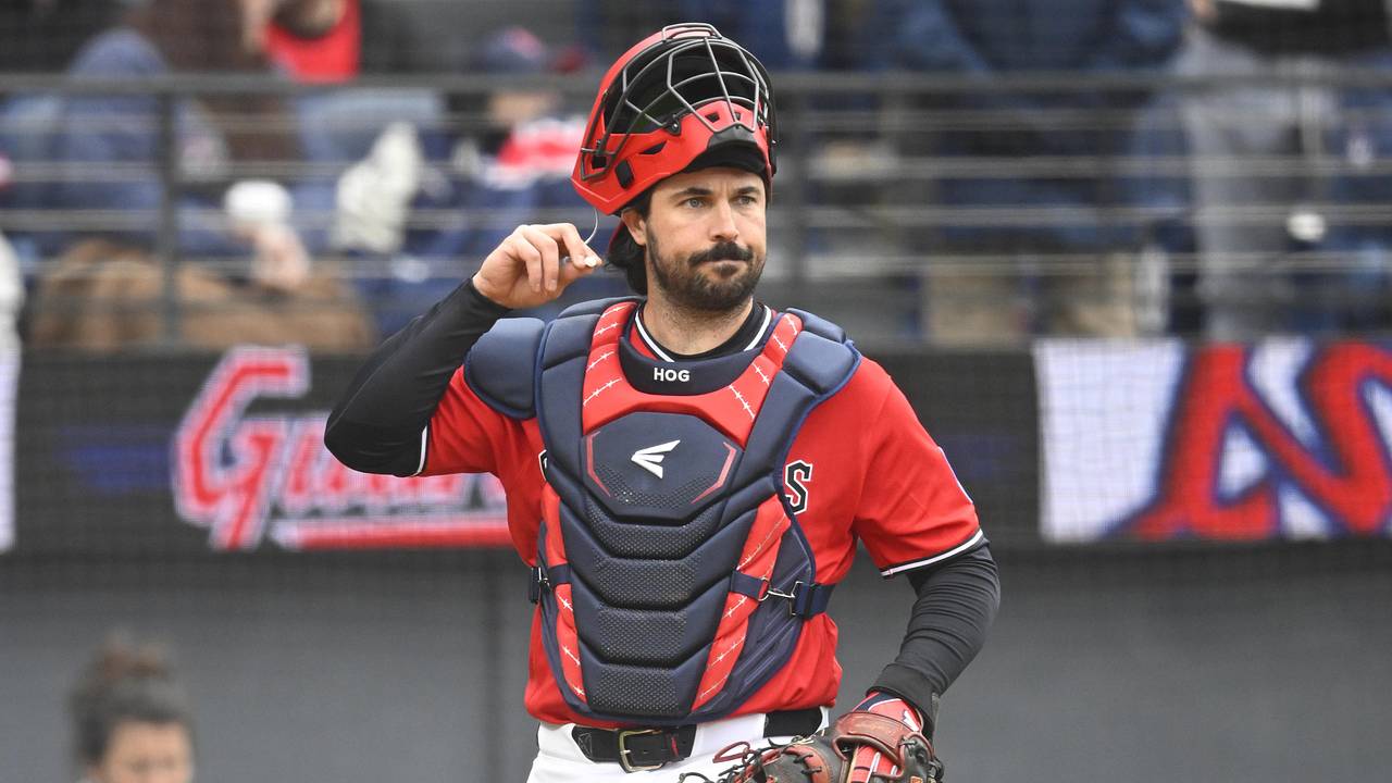 Guardians catcher Austin Hedges walks across the infield at Progressive Field in Cleveland.