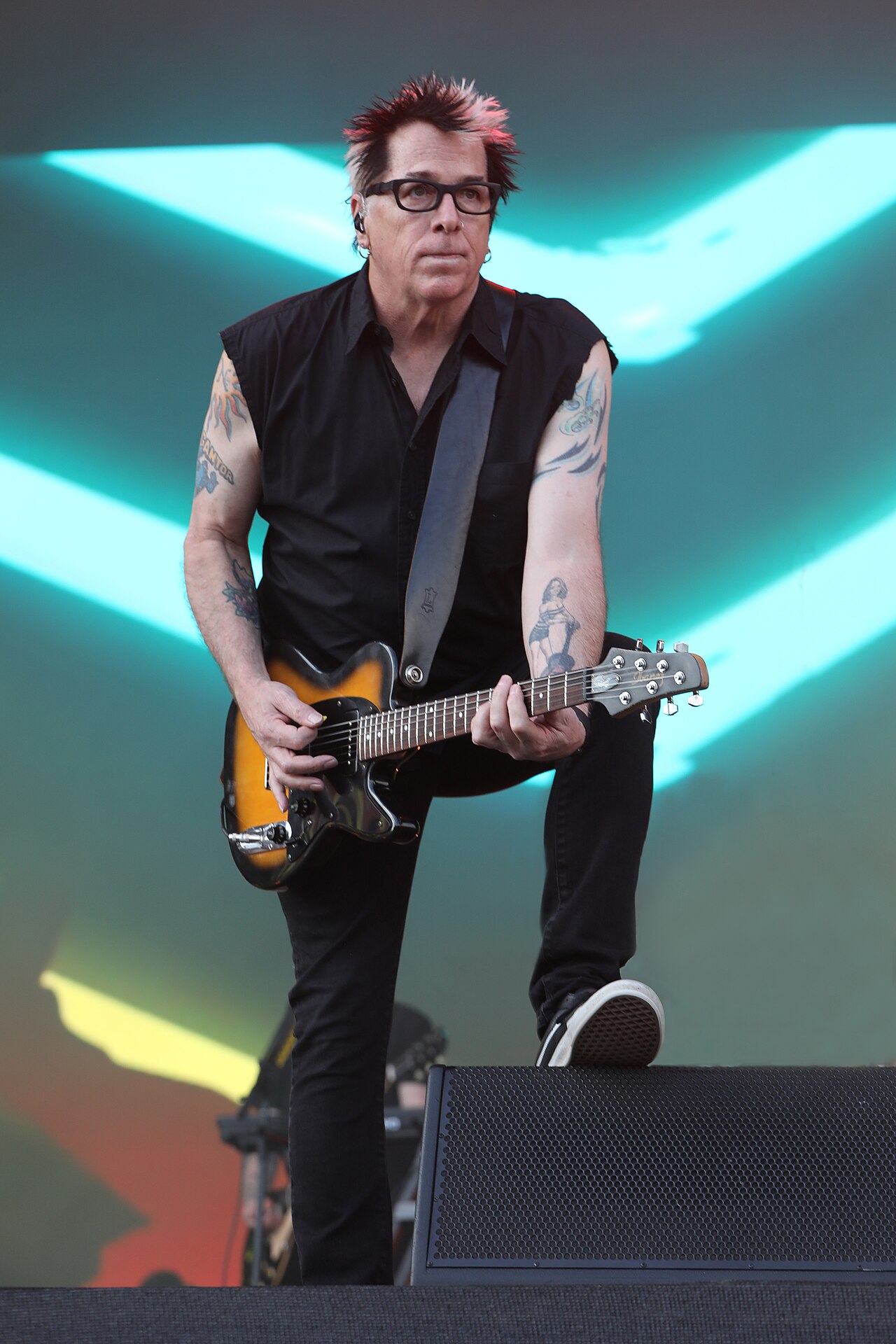 Offspring guitarist Noodles performing on stage at Rock im Park in 2022