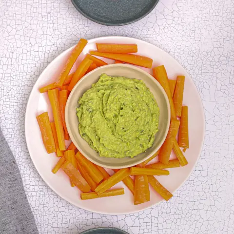 A prepared serving of edamame and avocado dip
