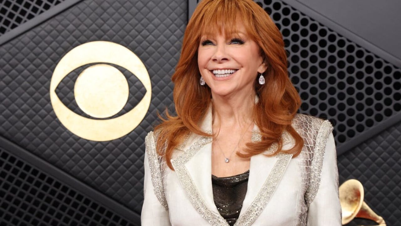 Reba McEntire poses on the Grammy Awards red carpet in February 2026; archival photo, not from the family announcement.