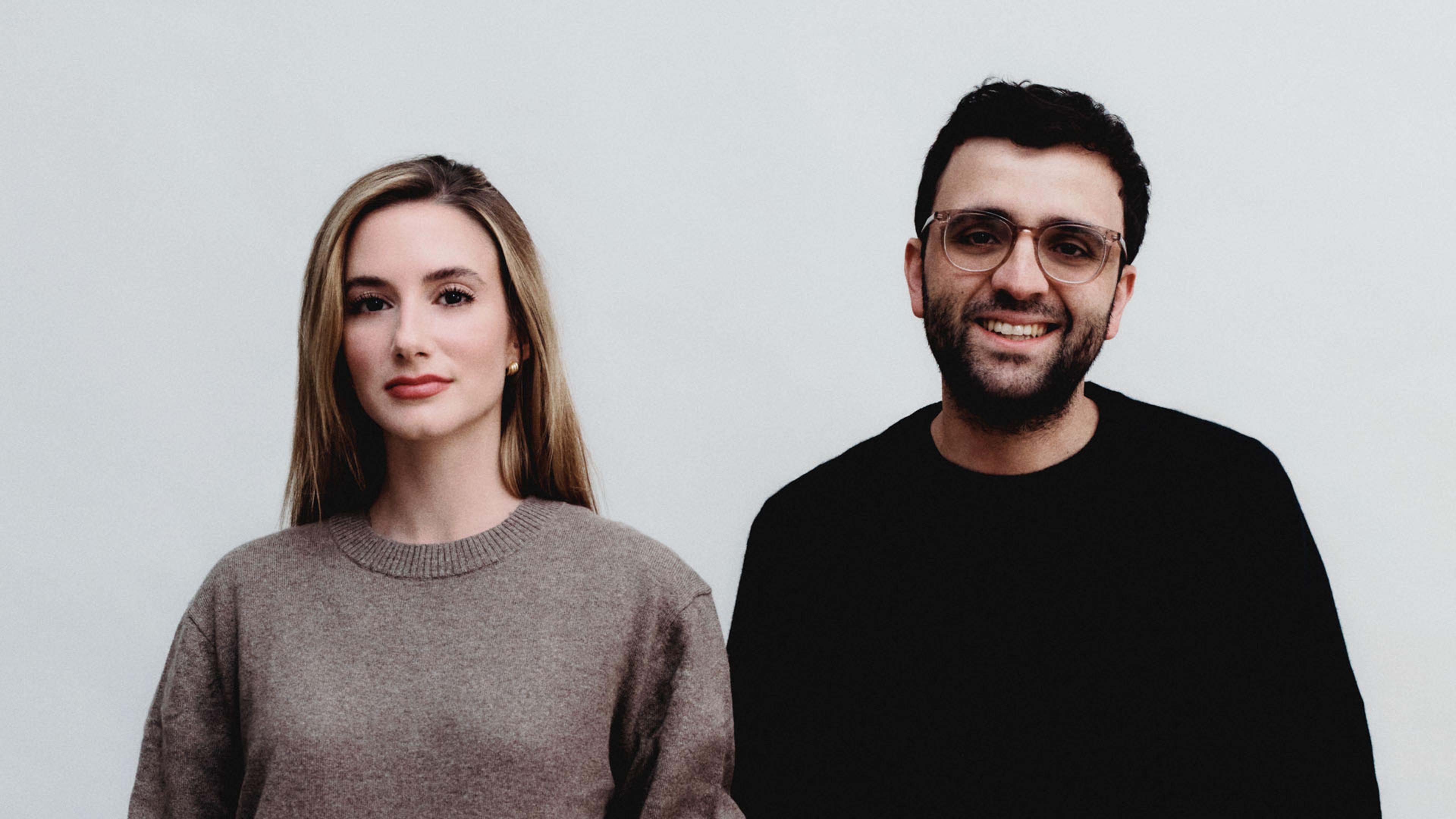Kalshi co-founders Tarek Mansour and Luana Lopes Lara pose for a studio portrait.