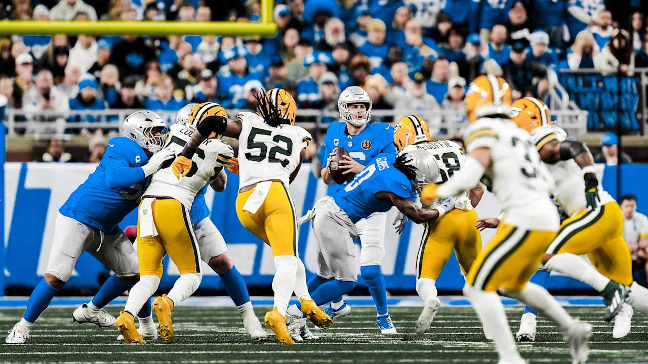 Jared Goff drops back to pass against Green Bay during a Packers-Lions game at Ford Field
