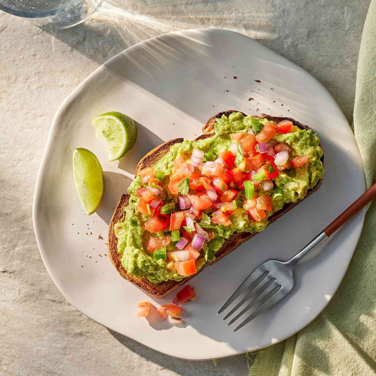 A prepared serving of salsa-topped avocado toast