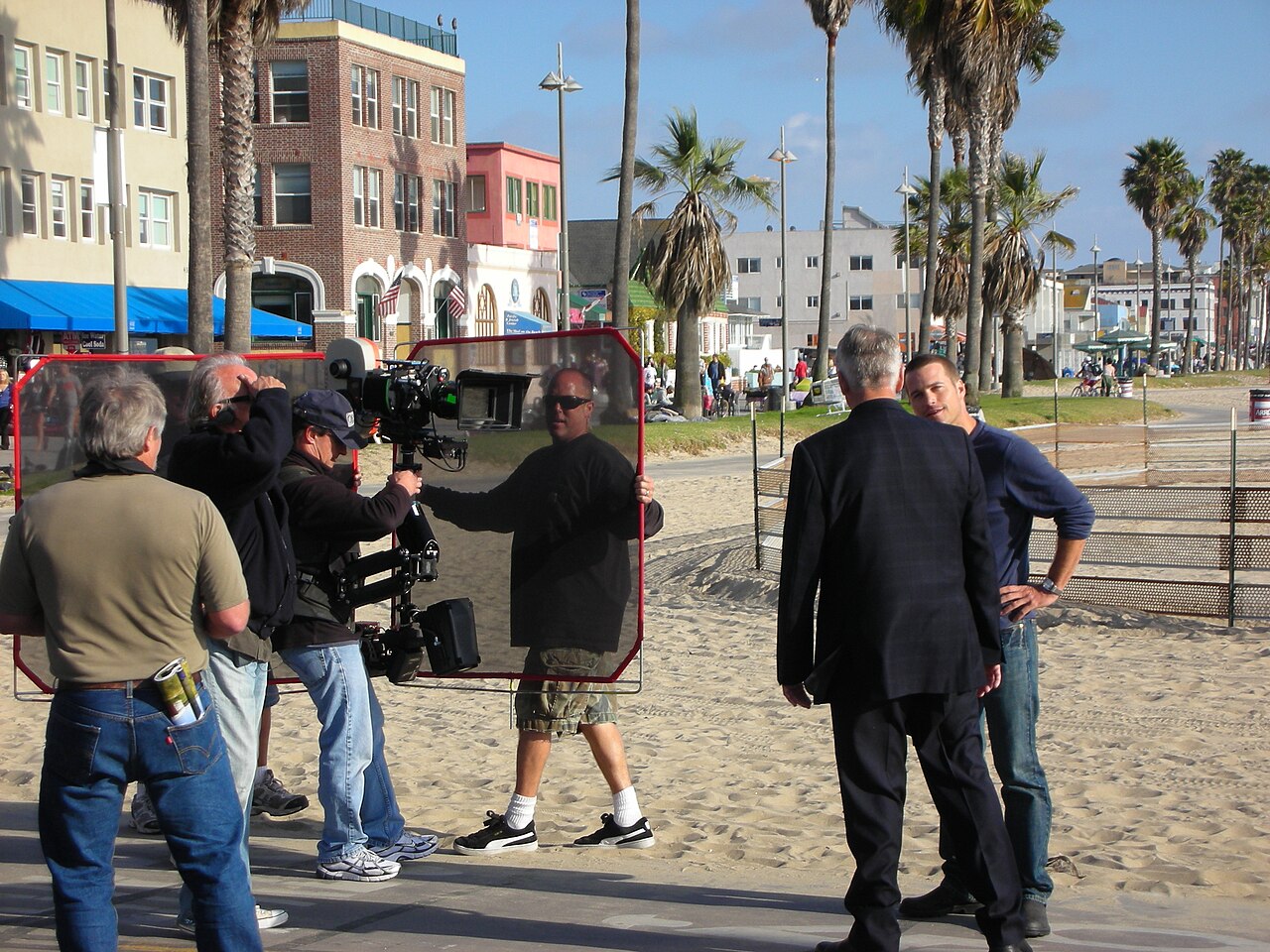 File photo of Mark Harmon with co-star Chris O'Donnell during NCIS filming in March 2009, not from the Origins episode