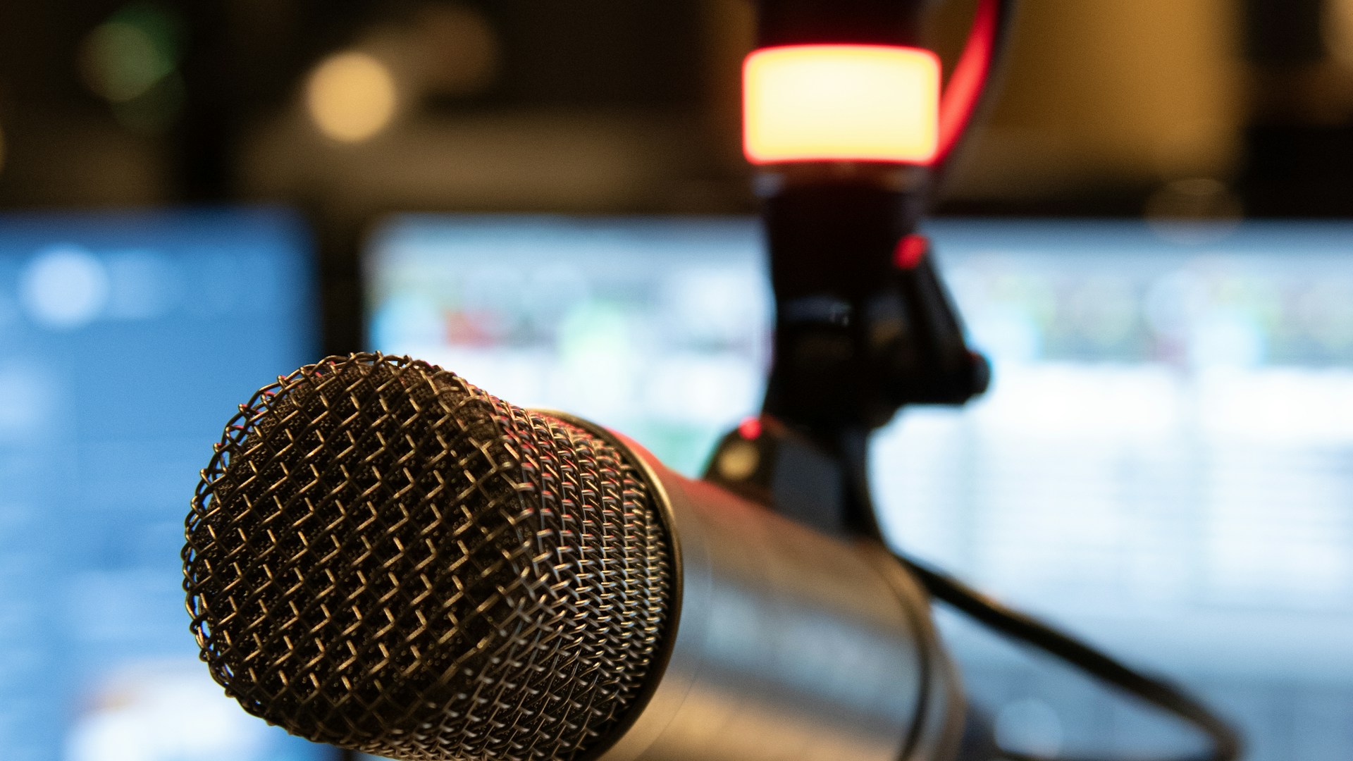 Broadcast microphone in a radio studio, used as an illustrative image