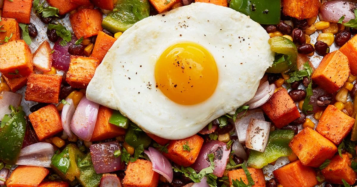 A prepared serving of sweet potato and black bean breakfast hash