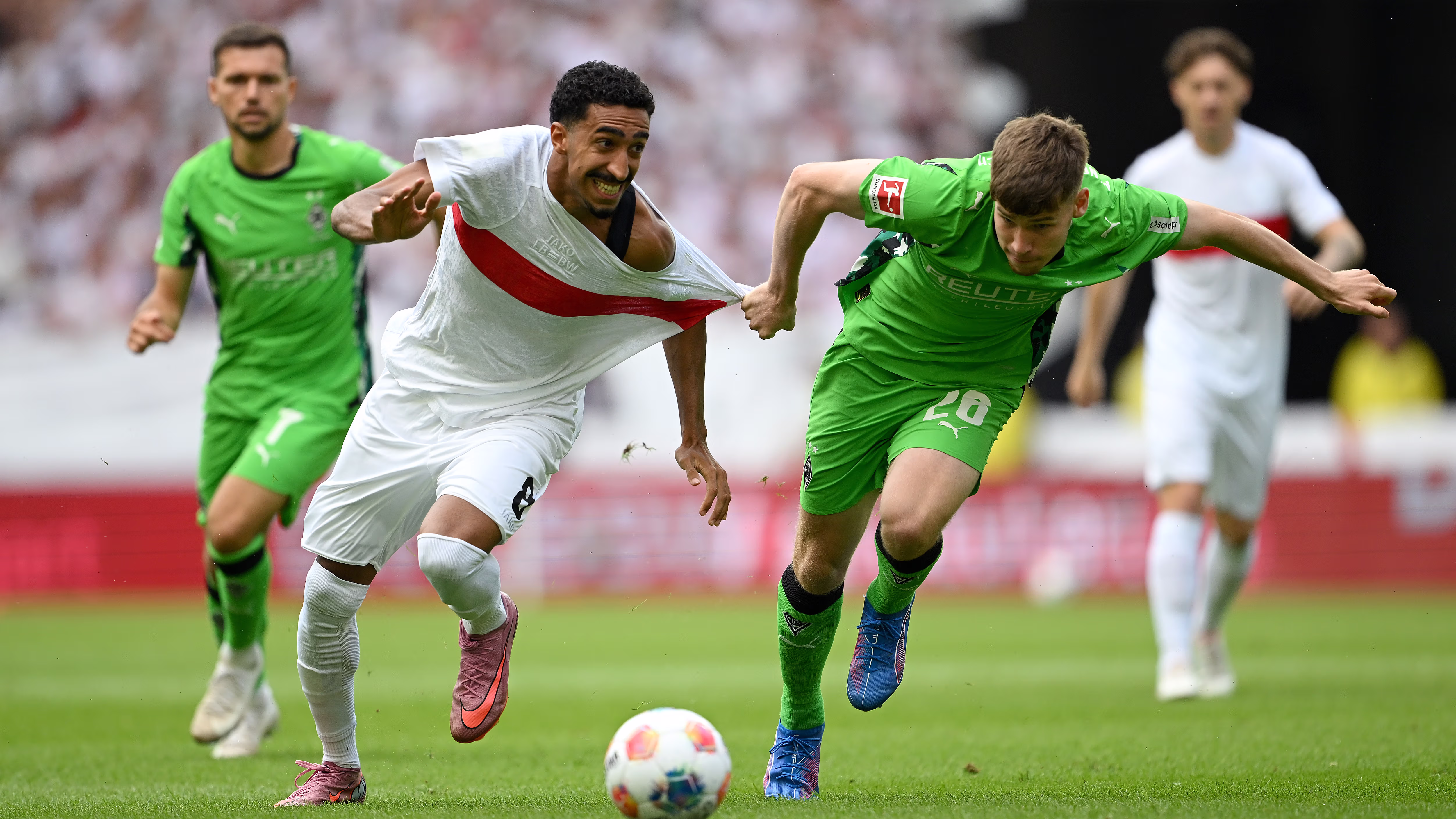 Stuttgart and Borussia Mönchengladbach players contest the ball in an earlier league meeting
