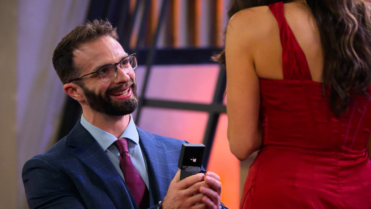 Scott ‘Stew’ Stewart and Jacqueline ‘Jax’ Guelli on Love Is Blind Season 11, in a Netflix Tudum promotional image.