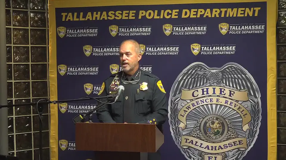 Tallahassee Police Chief Lawrence Revell speaks at a podium during a briefing on the Perry Street shooting
