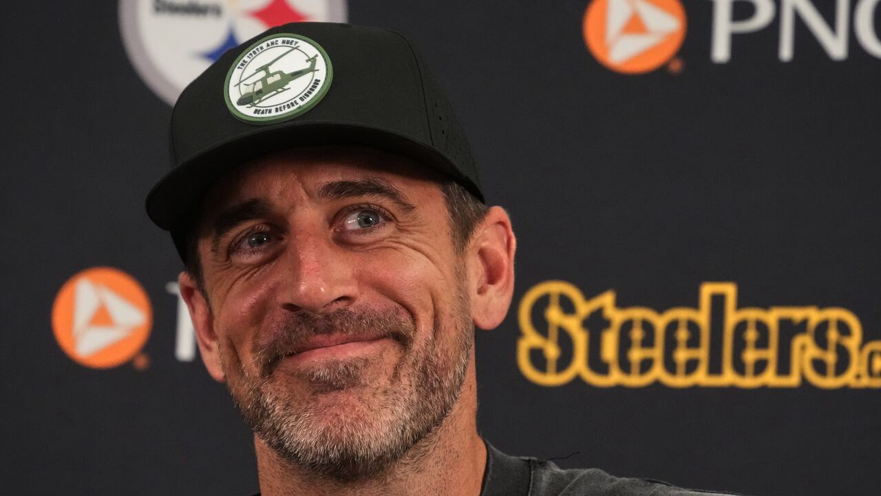 Aaron Rodgers speaks with reporters at Pittsburgh Steelers training camp in Latrobe, Pennsylvania.