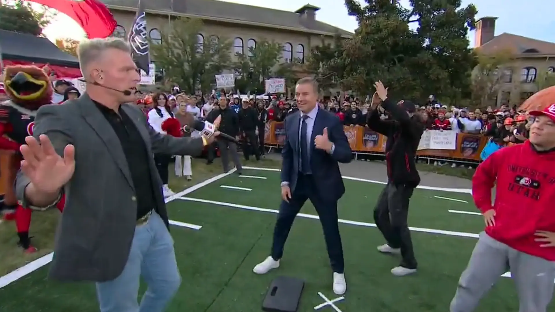 Pat McAfee holds a microphone during the College GameDay kicking contest at Utah in 2025