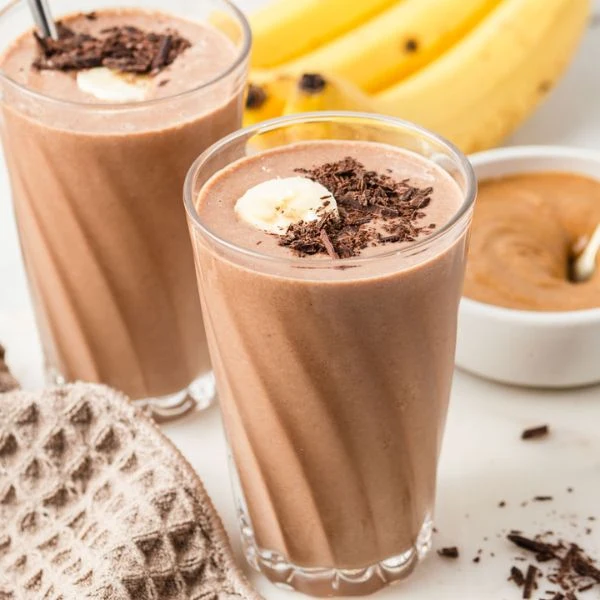 A prepared serving of peanut butter-chocolate banana smoothie