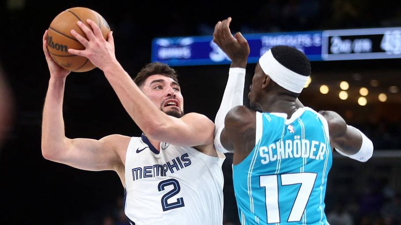 Memphis Grizzlies guard Ty Jerome drives against Charlotte in a preseason game; archival photo, not the Oct. 21 Jazz game.